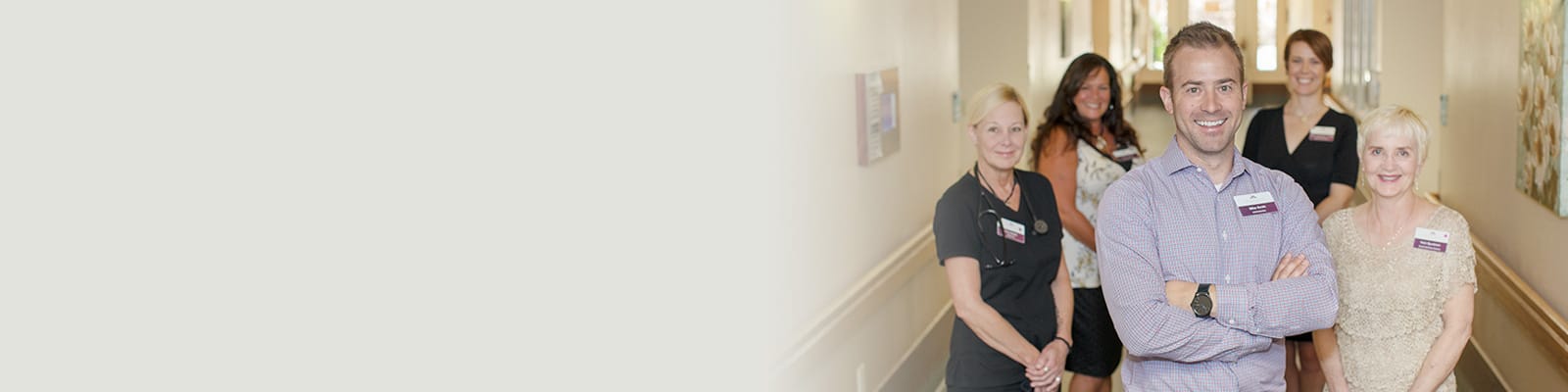 Several nurses and caregivers in the hallway at Crystal Ridge Care Center