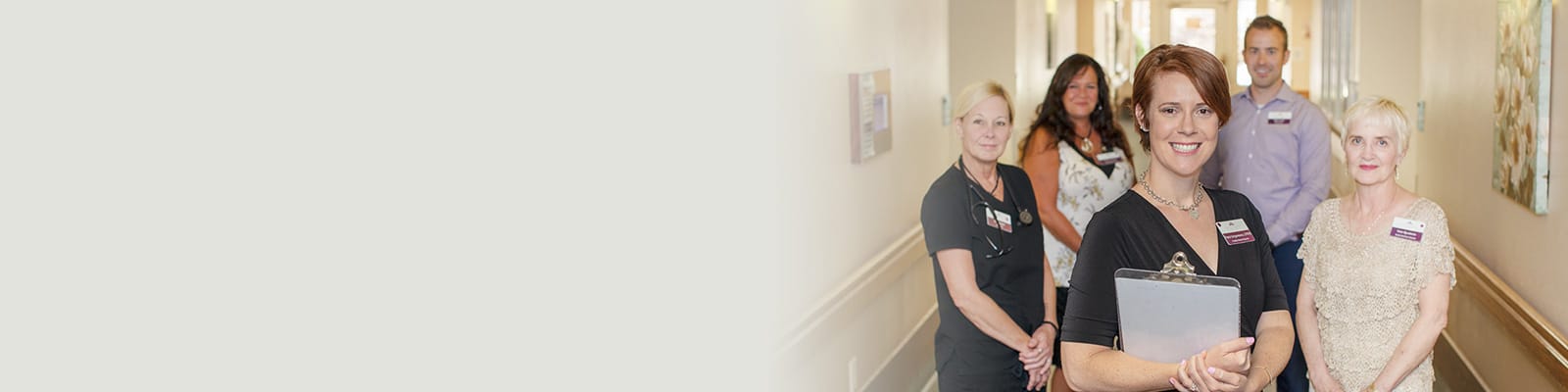 Several nurses and caregivers in the hallway at Crystal Ridge Care Center